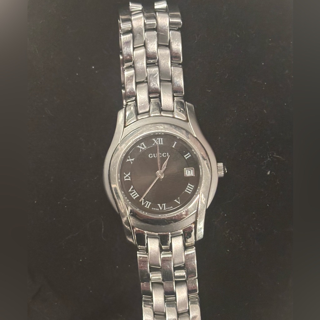 Gucci Silver Timepiece With Black Dial